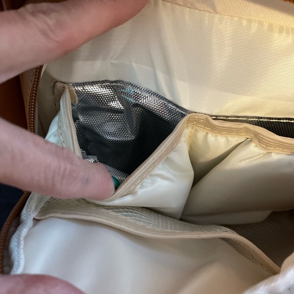 Diaper bag never used. Has soft leatherlook.( man made material) - Picture 6 of 8